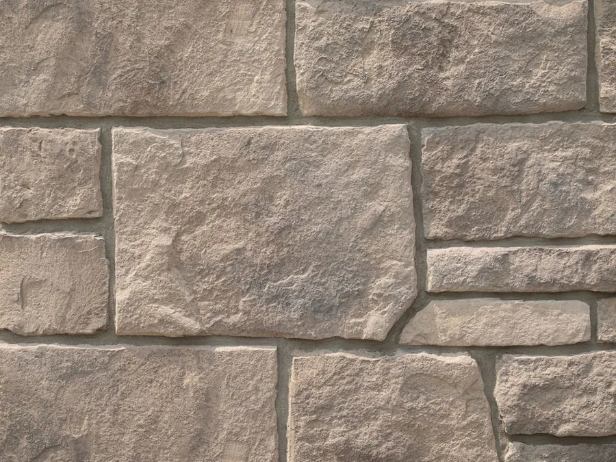 Prestige Stone Midwest Dimensional manufactured stone veneer in Pebble, close-up