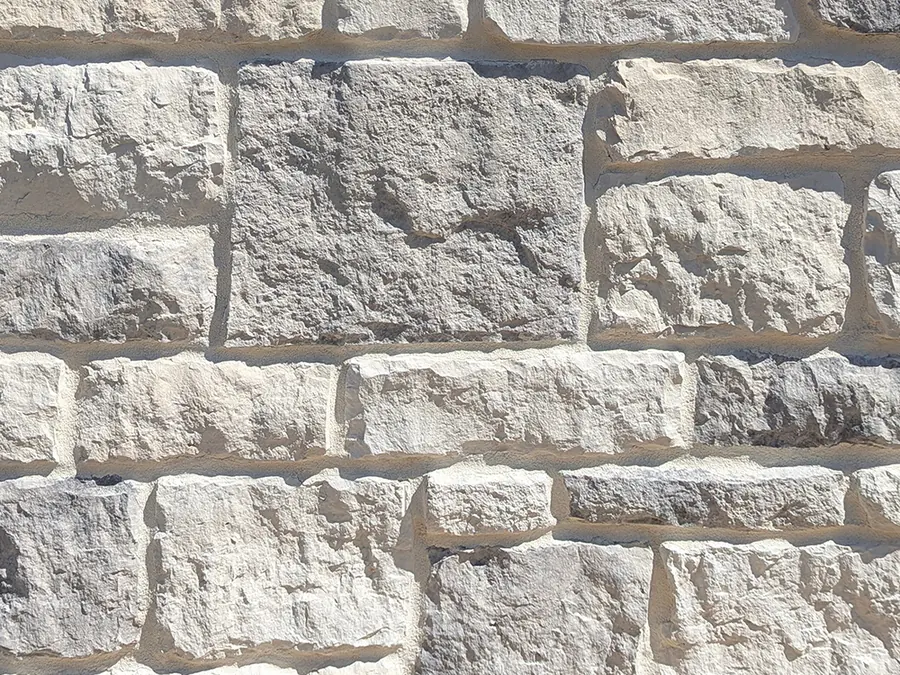 Prestige Stone Southern Limestone manufactured stone veneer in Acadia, close-up